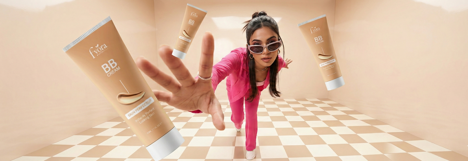 Woman in pink outfit with sunglasses surrounded by BB cream tubes on a checkered floor.